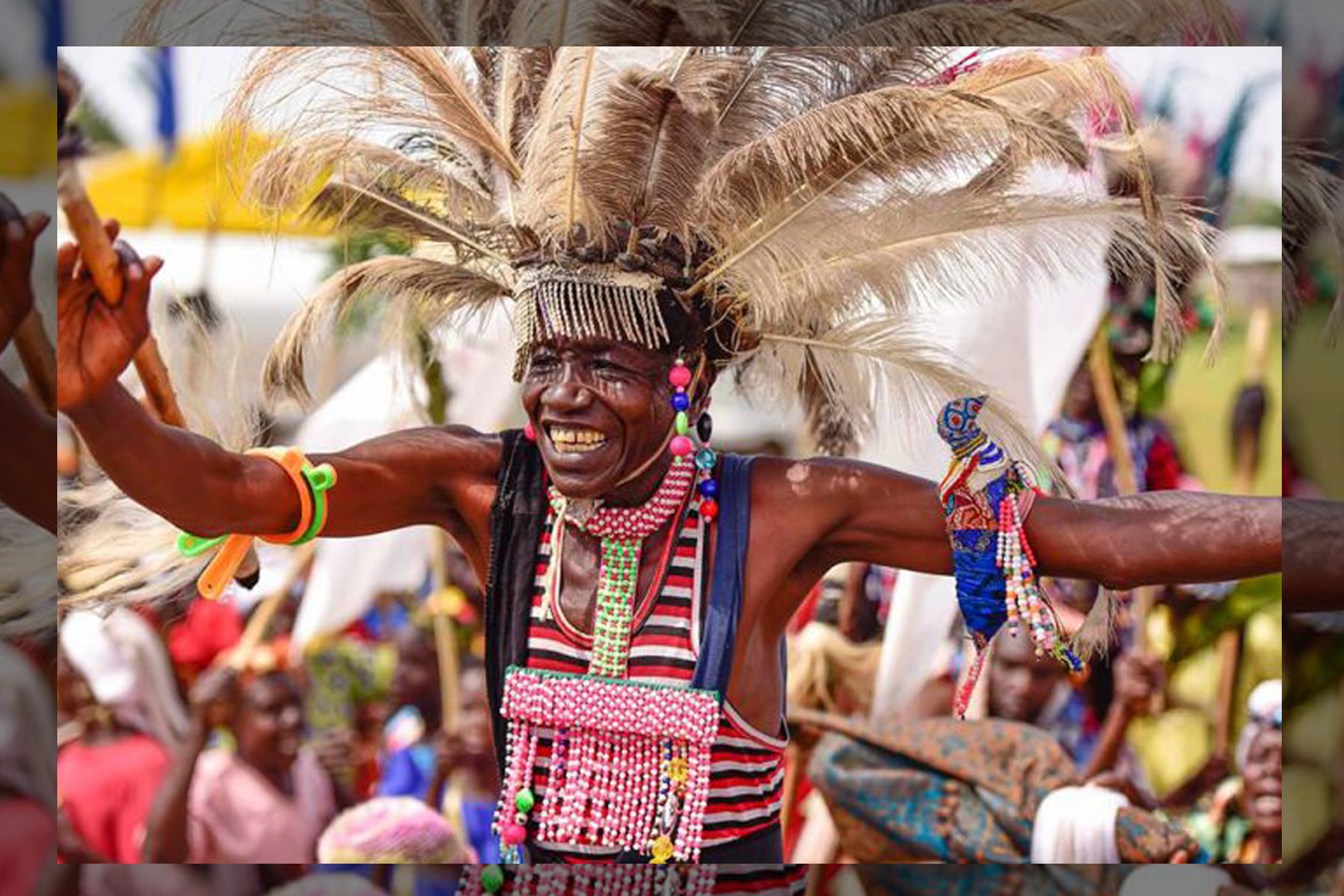 Iteso man showcasing the traditional dance