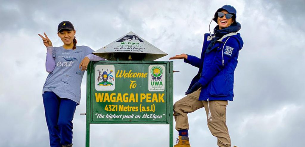 Hikers at the top of Wagagai Peak on Mount Elgon. Credit: Home of Friends