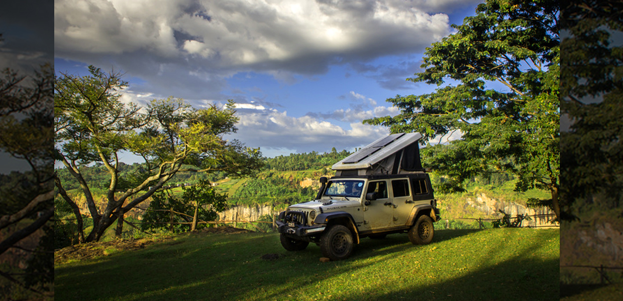 A tourist jeep at Moses campsite, near Sipi Falls, Mount Elgon. Credit: The Road Chose Me
